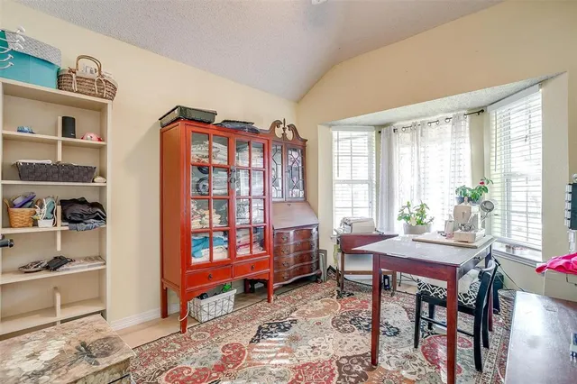 a room with furniture and a window