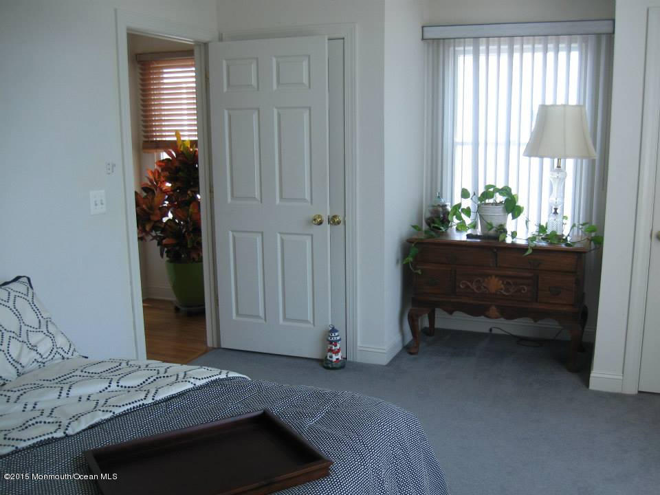 59 A Topsail Road Brick, NJ 08723 - Photo 12 of 18 a bedroom with a bed and a window