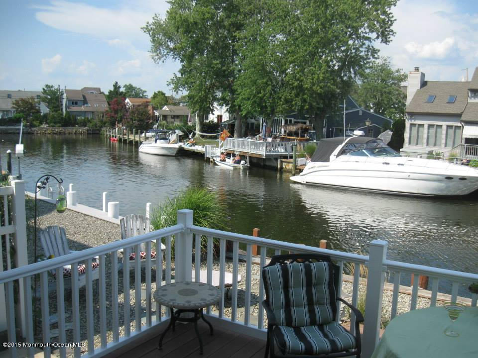 59 A Topsail Road Brick, NJ 08723 - Photo 17 of 18 a view of a lake with house