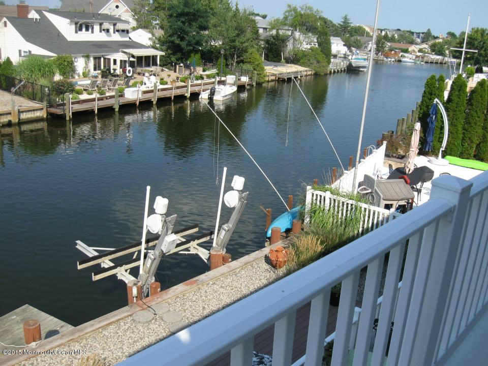 59 A Topsail Road Brick, NJ 08723 - Photo 18 of 18 a view of a lake from a balcony