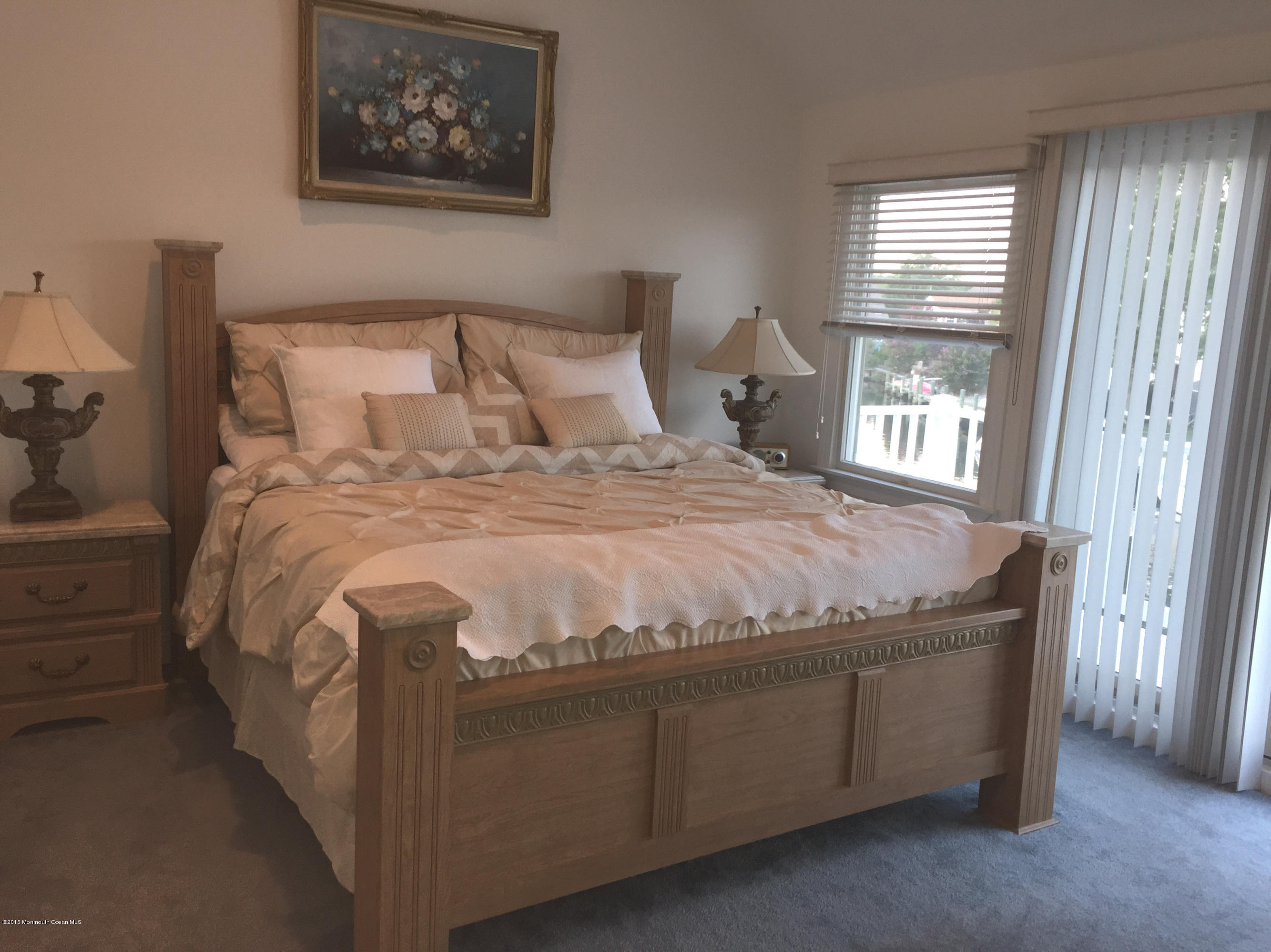 59 A Topsail Road Brick, NJ 08723 - Photo 7 of 18 a bedroom with a bed and window