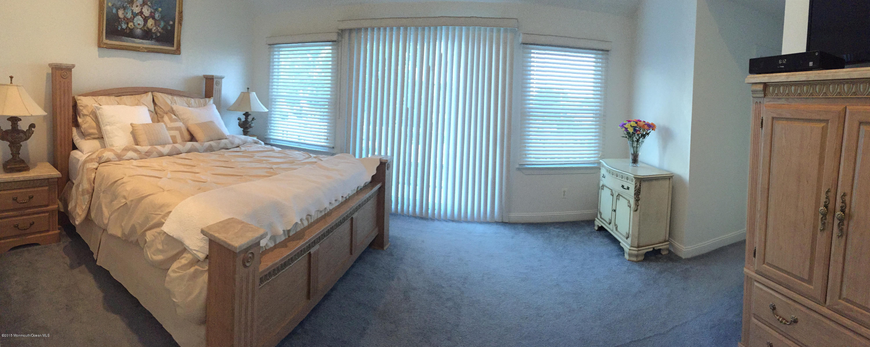 59 A Topsail Road Brick, NJ 08723 - Photo 8 of 18 a bed sitting in a bedroom next to a window and a livingroom