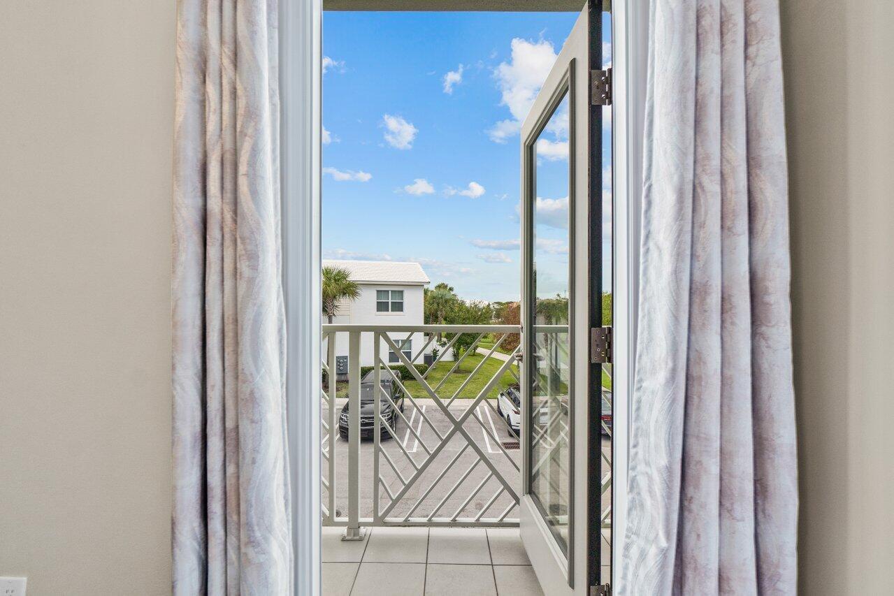 62 Sabal Court Royal Palm Beach, FL 33411 - Photo 22 of 44 Guest Bedroom Balcony