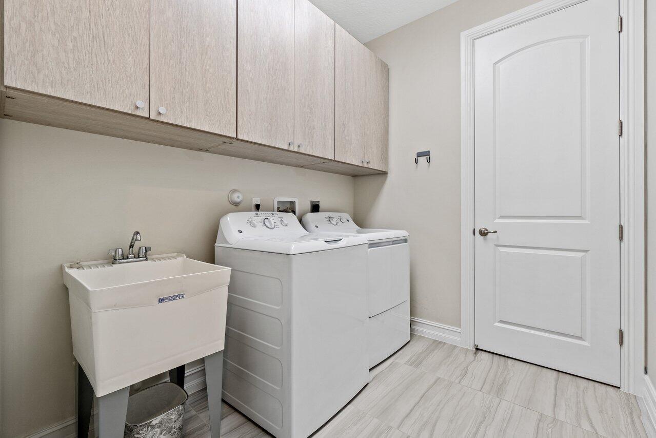 62 Sabal Court Royal Palm Beach, FL 33411 - Photo 23 of 44 Large Laundry Room
