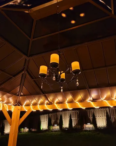 a view of a swimming pool with an outdoor seating