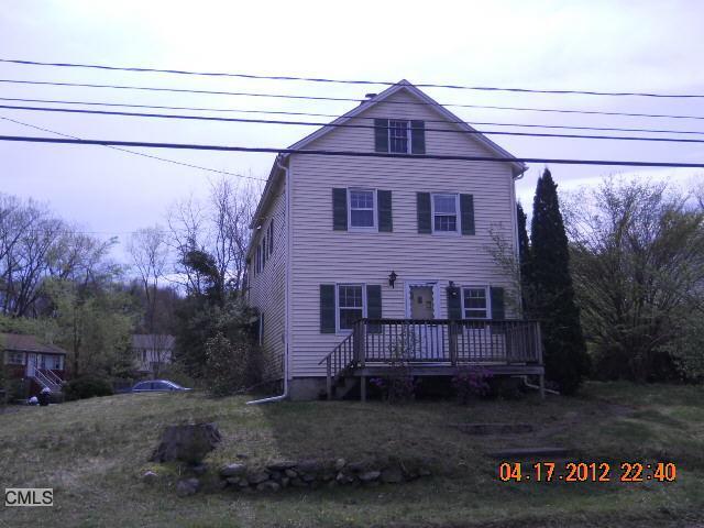 22 Plumtrees Road Bethel, CT 06801 - Photo 1 of 1 a view of a house with a yard