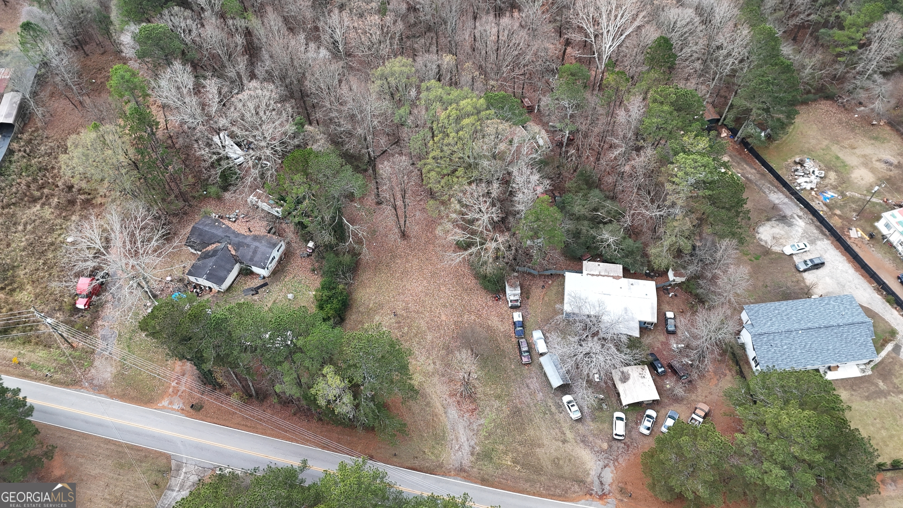 7307 Williams Street Flowery Branch, GA 30542 - Photo 25 of 33 an aerial view of residential house with outdoor space