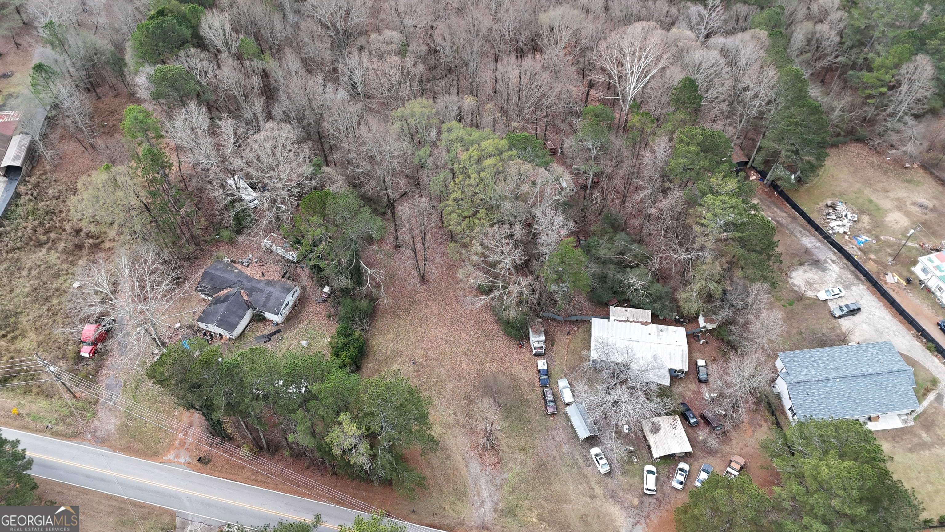 7307 Williams Street Flowery Branch, GA 30542 - Photo 31 of 33 an aerial view of residential house with outdoor space
