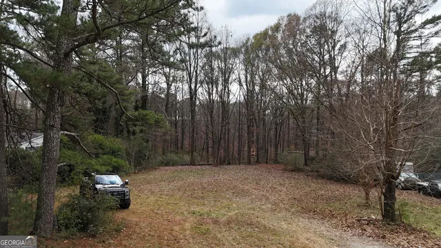 an aerial view of residential house with outdoor space