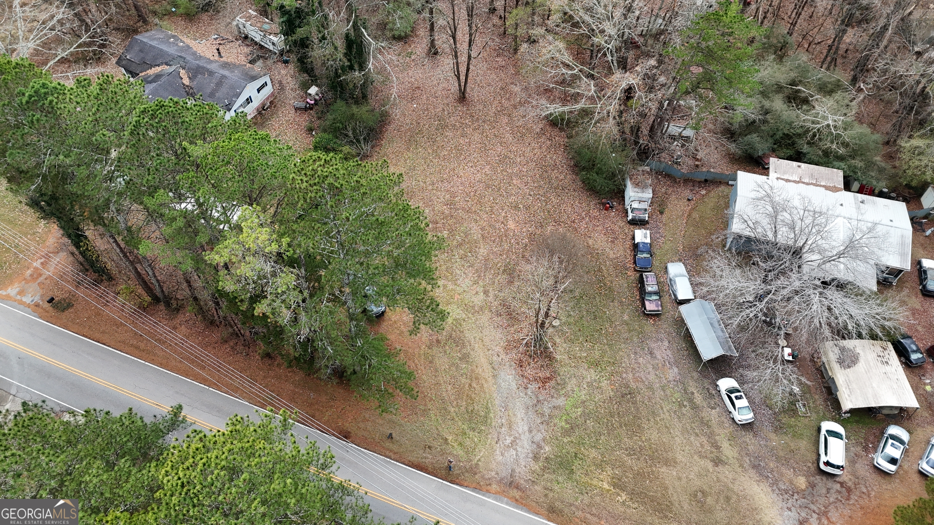 7307 Williams Street Flowery Branch, GA 30542 - Photo 9 of 33 an aerial view of residential house with outdoor space