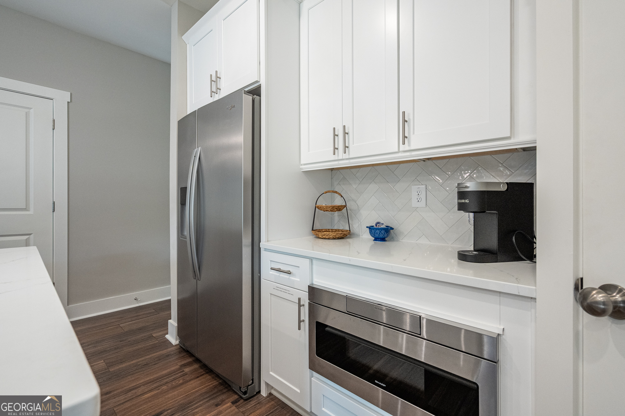 143 Old Alabama Road Southeast Emerson, GA 30137 - Photo 12 of 48 a kitchen with stainless steel appliances white cabinets and a sink