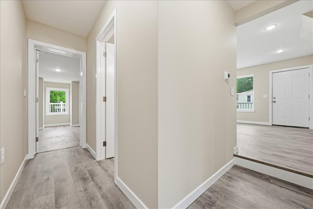 5641 North Coplay Road Whitehall, PA 18052 - Photo 38 of 68 Clean lines and light-toned flooring characterize this well-maintained interior hallway.