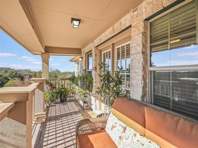 a balcony with furniture