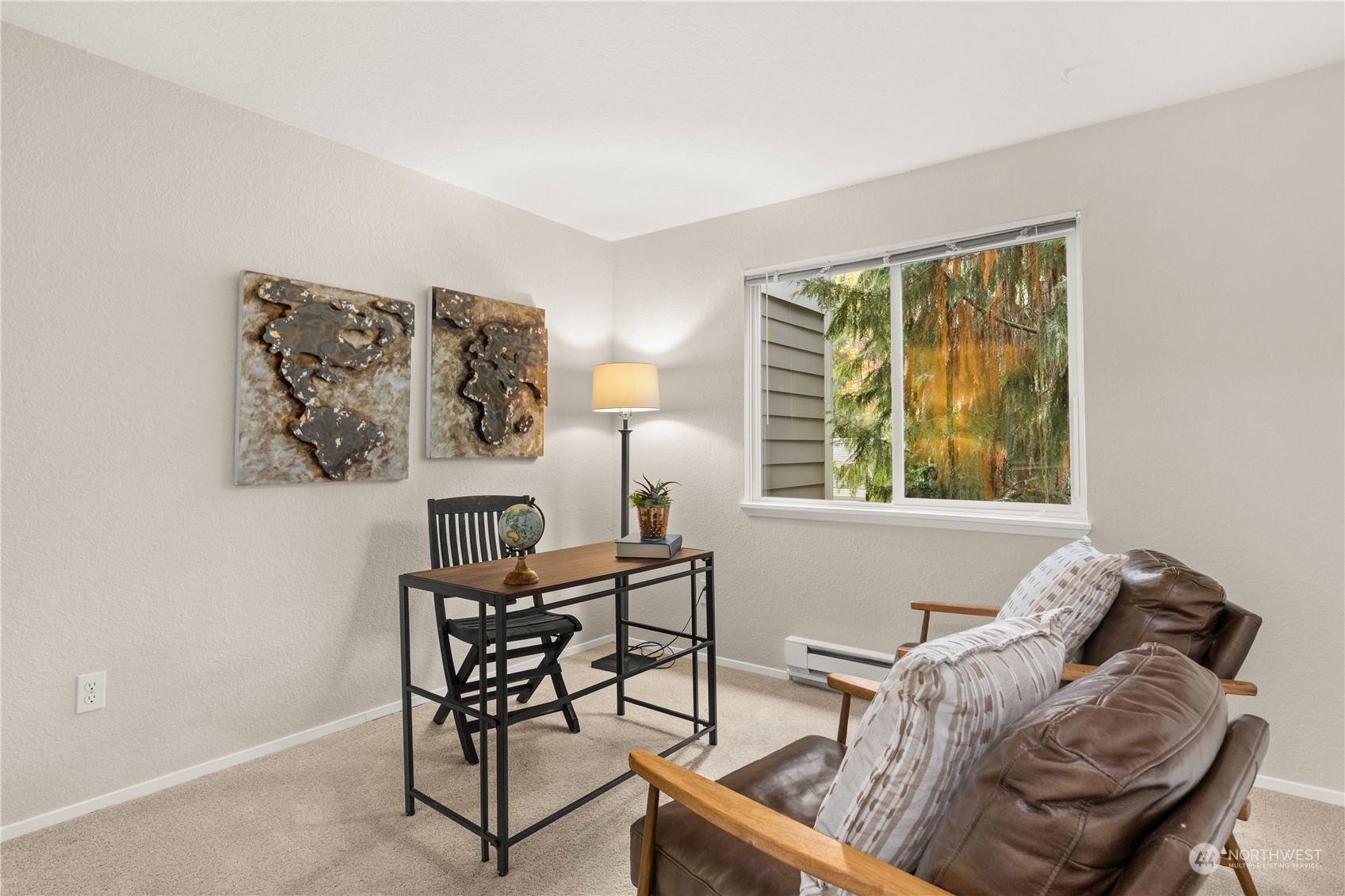 10822 East Riverside Drive, Unit A204 Bothell, WA 98011 - Photo 13 of 22 a living room with furniture and a window
