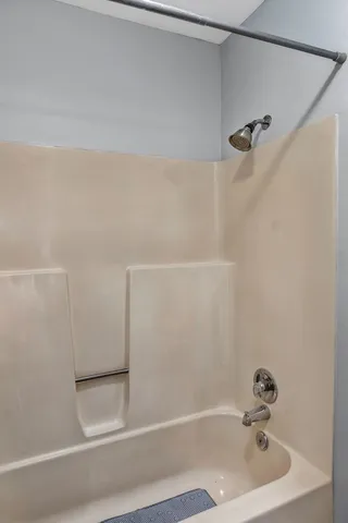 a bathroom with a bathtub