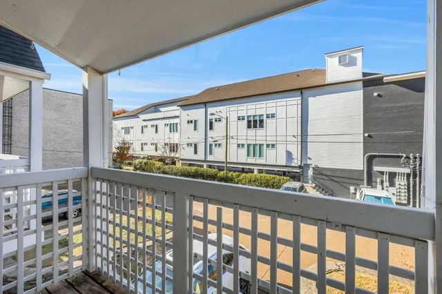 a view of a building from a balcony