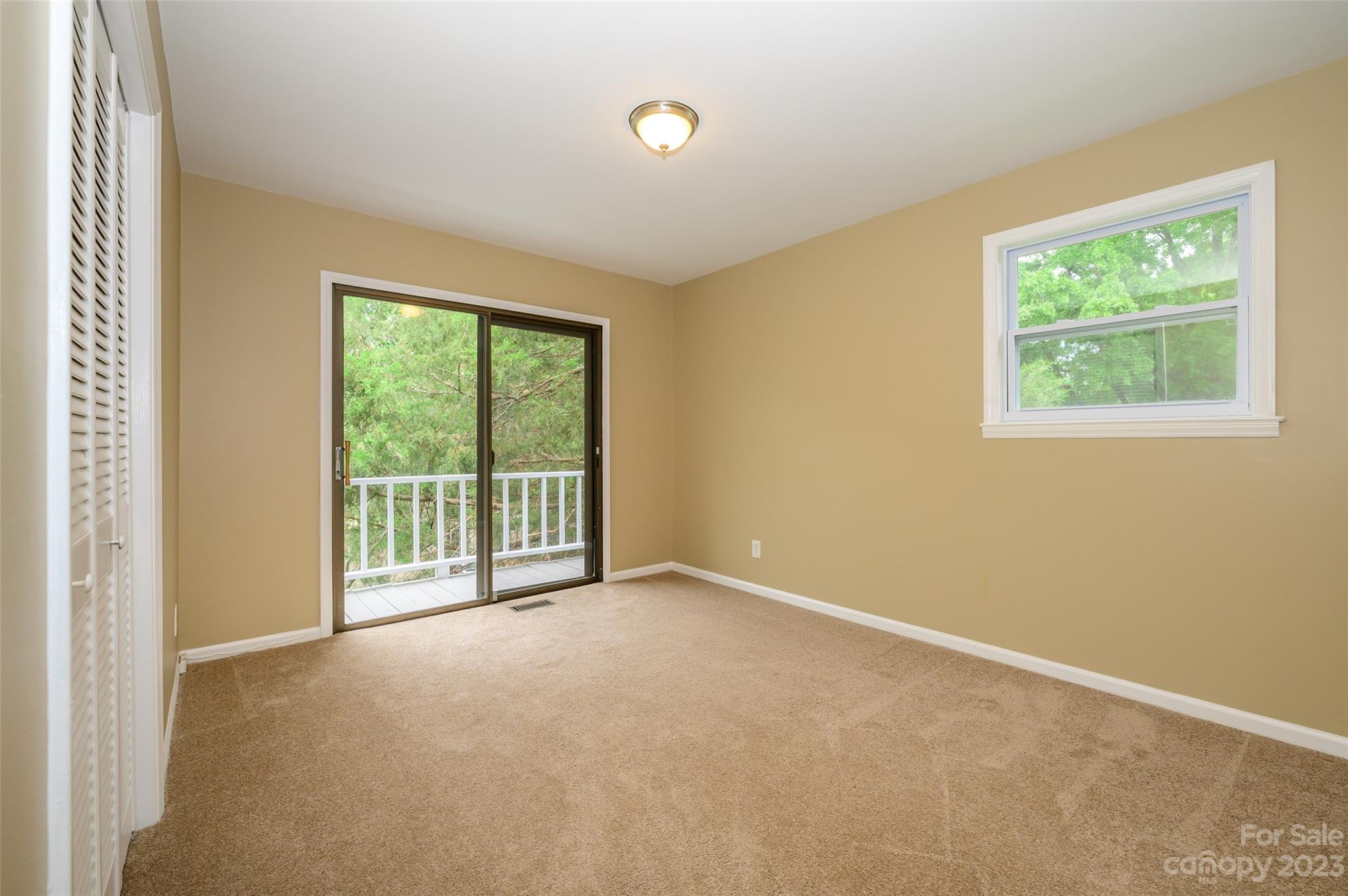 16079 Molokai Drive Tega Cay, SC 29708 - Photo 22 of 41 a view of an empty room with a window