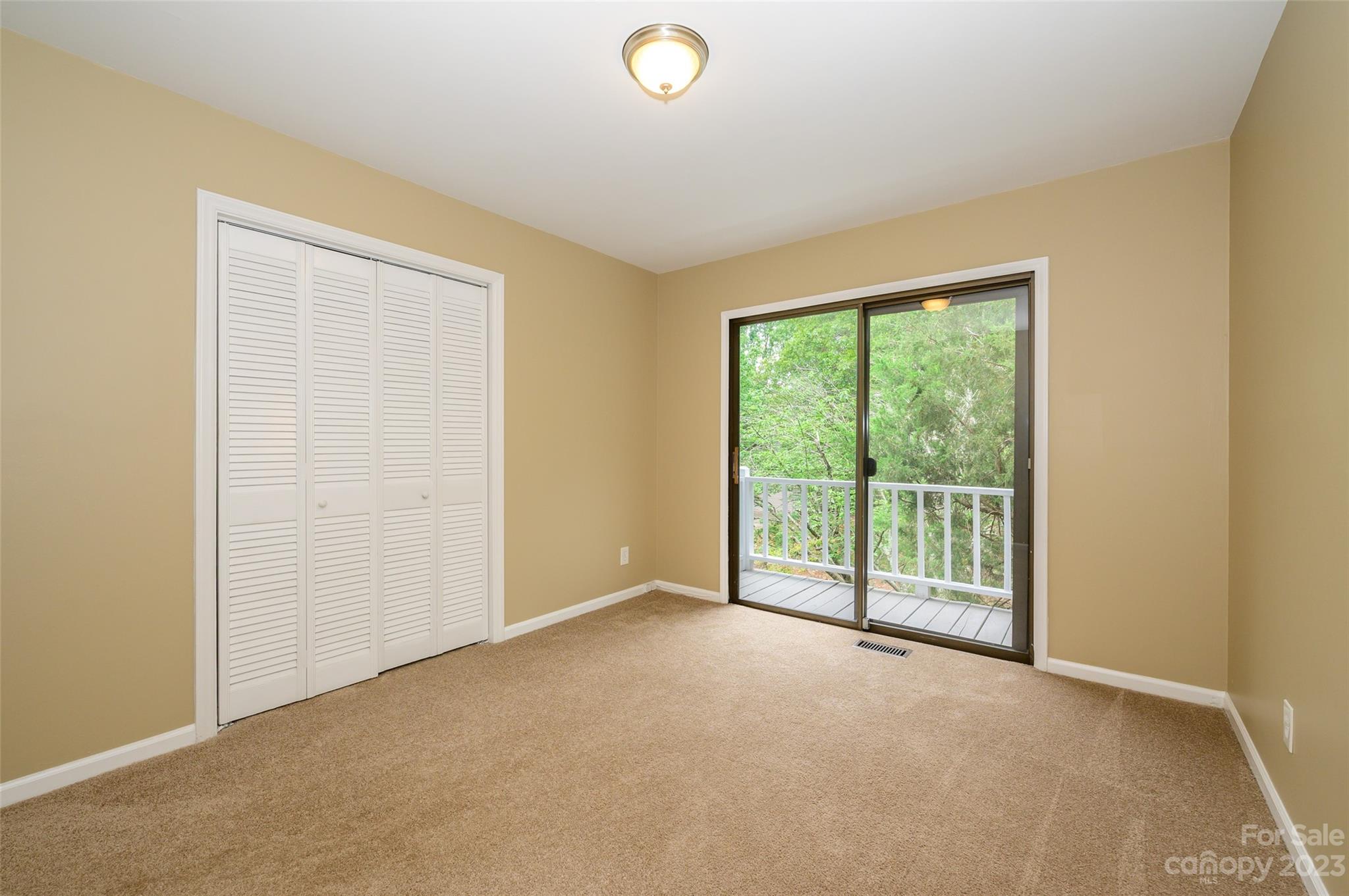 16079 Molokai Drive Tega Cay, SC 29708 - Photo 23 of 41 a view of an empty room with a window