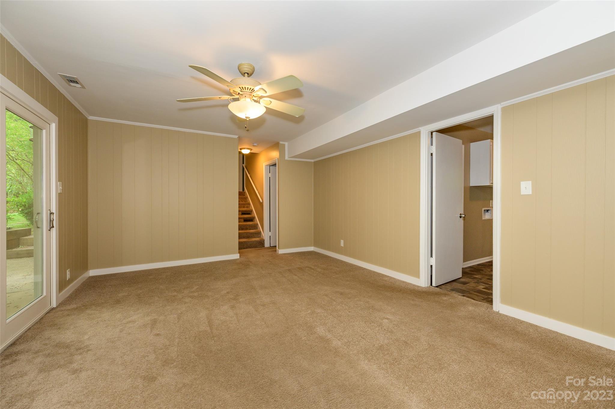 16079 Molokai Drive Tega Cay, SC 29708 - Photo 32 of 41 an empty room with a ceiling fan and a window