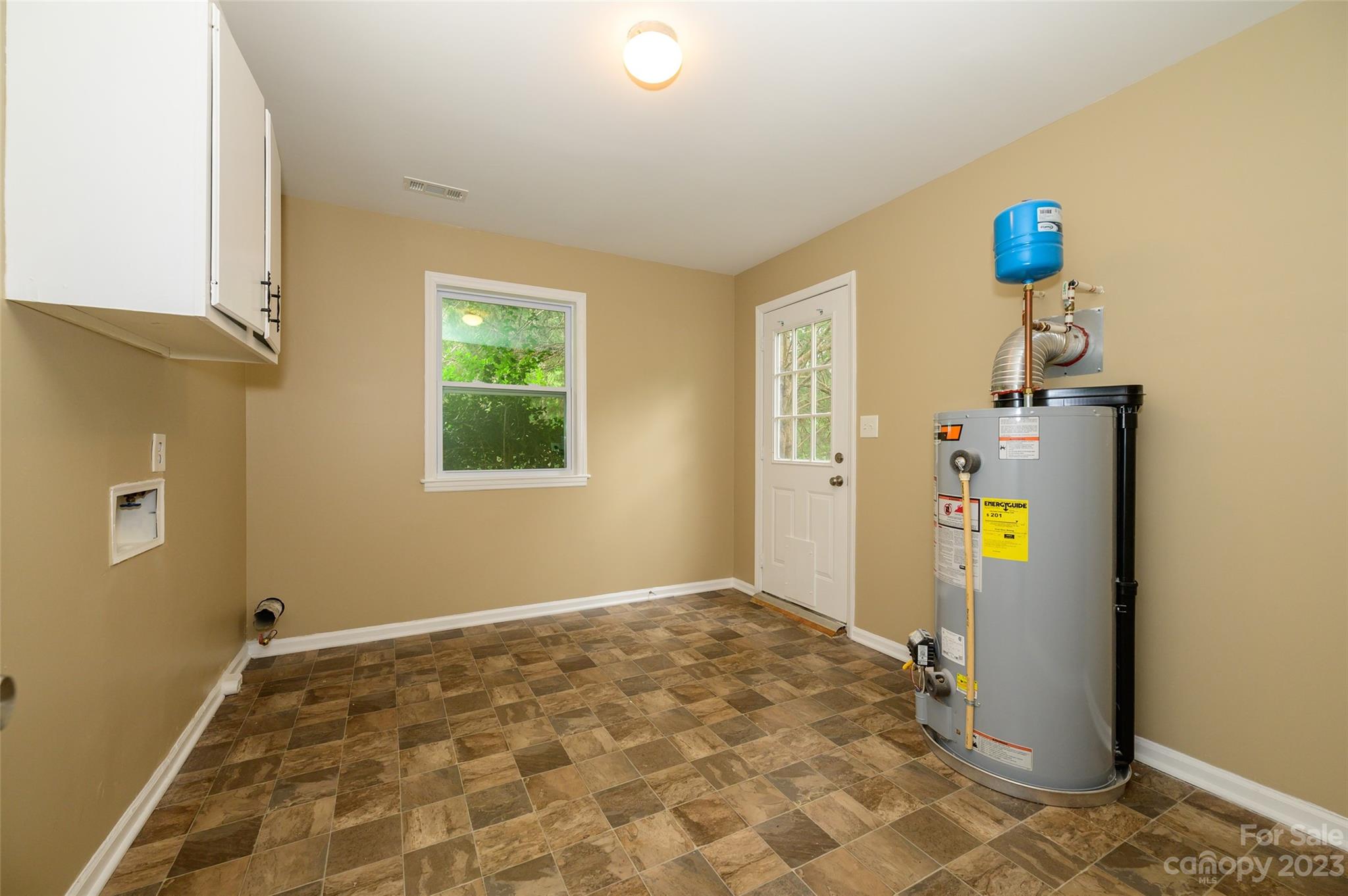 16079 Molokai Drive Tega Cay, SC 29708 - Photo 34 of 41 a bedroom with a bed and a window