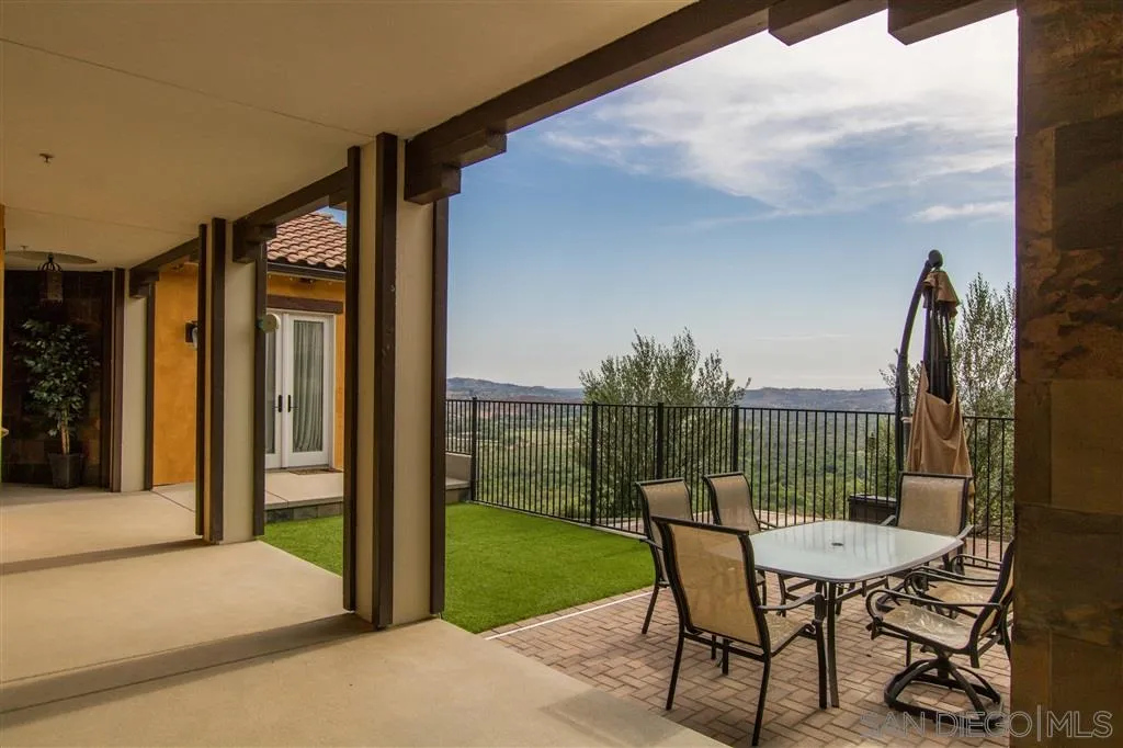 3507 Monserate Hill Road Fallbrook, CA 92028 - Photo 22 of 25 a view of a chair and tables in the patio