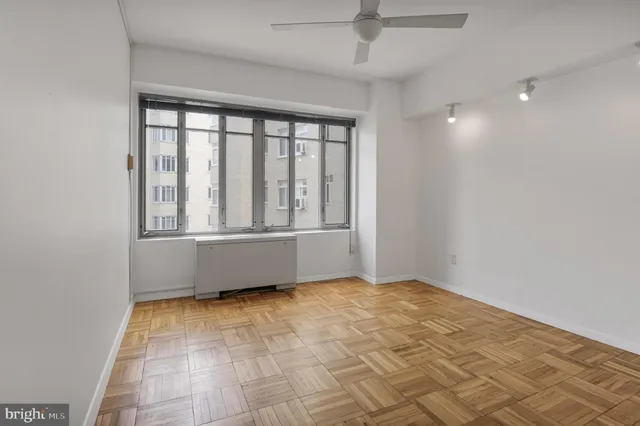 a kitchen that has a sink and a stove