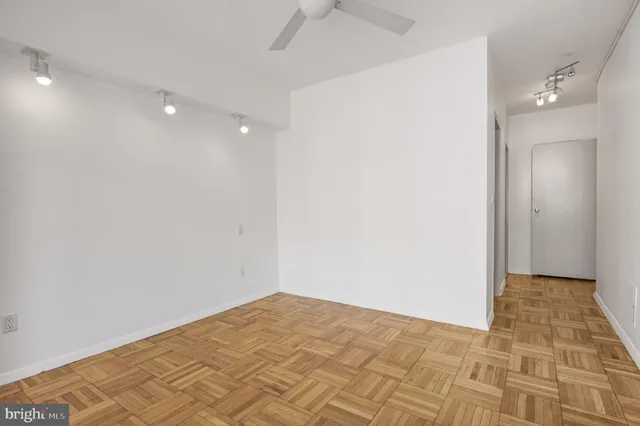 a view of an empty room with a window