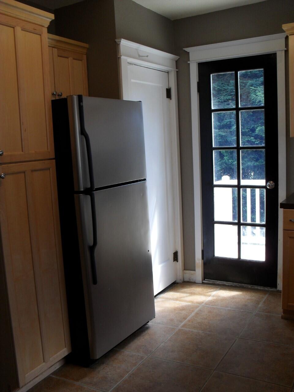12705 Us-101 Nehalem, OR 97131 - Photo 6 of 19 Nehalem Hwy 101 kitchen exterior door th