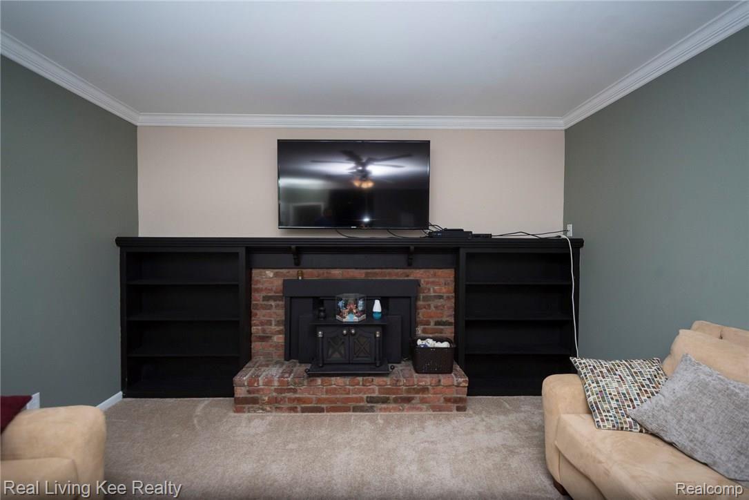 5191 Middleboro Road Grand Blanc, MI 48439 - Photo 15 of 37 great room with wood burning fireplace