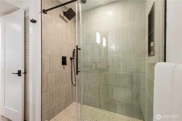 a kitchen with a stove and a window