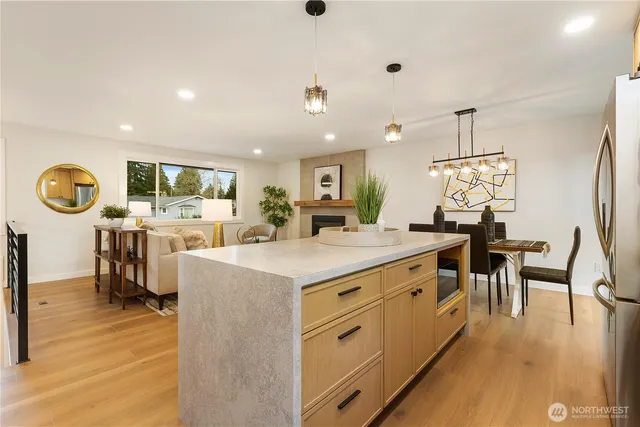 a view of a dining area with furniture window and wooden floor