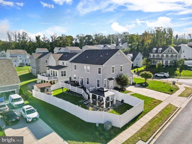 a view of a house with swimming pool and porch