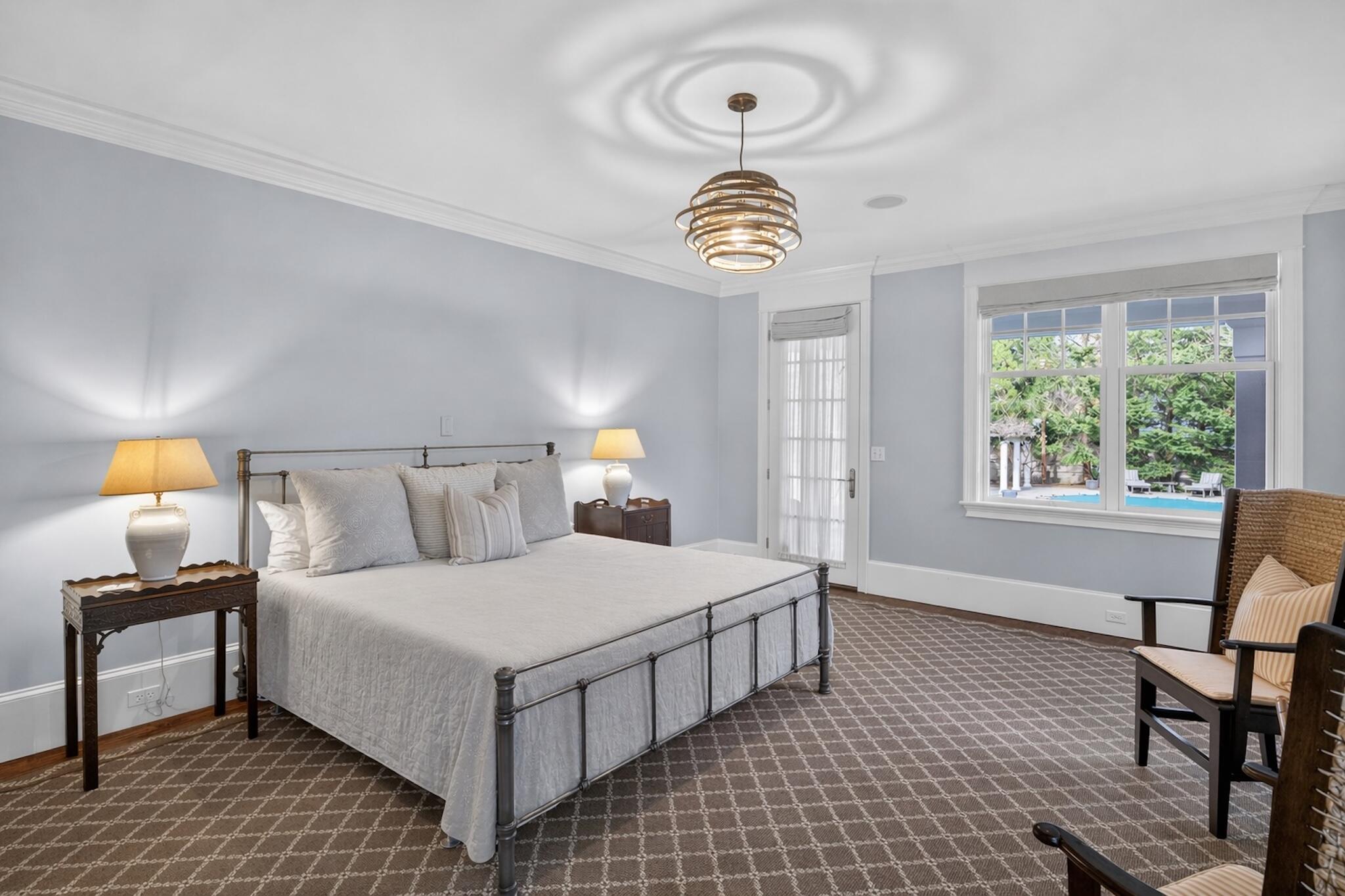 268 Parker Road Osterville, MA 02655 - Photo 11 of 18 a bedroom with a bed and a table