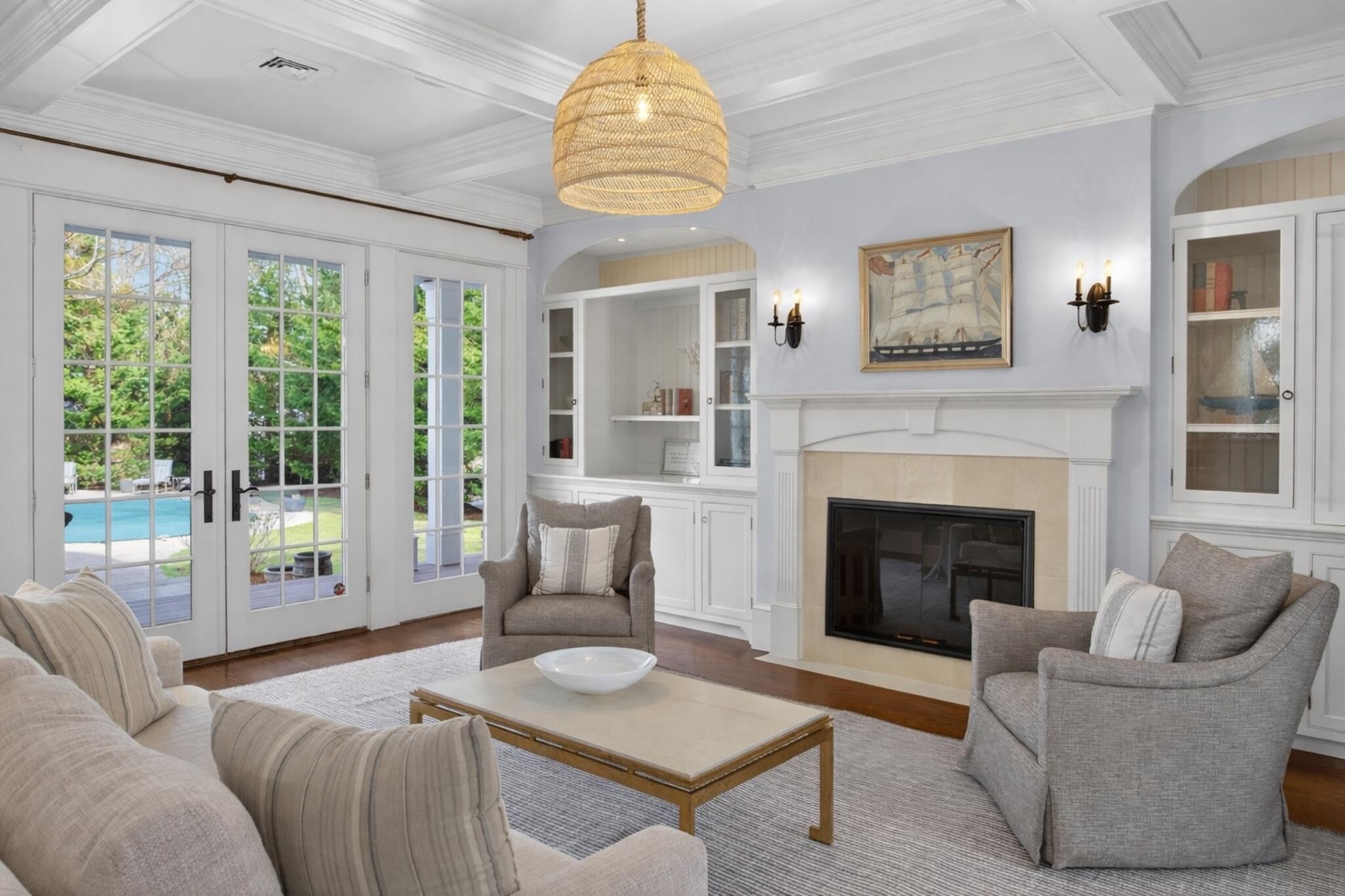 268 Parker Road Osterville, MA 02655 - Photo 7 of 18 a living room with furniture and a fireplace