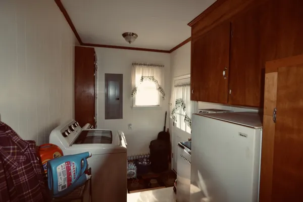 a bathroom with mirror and sink