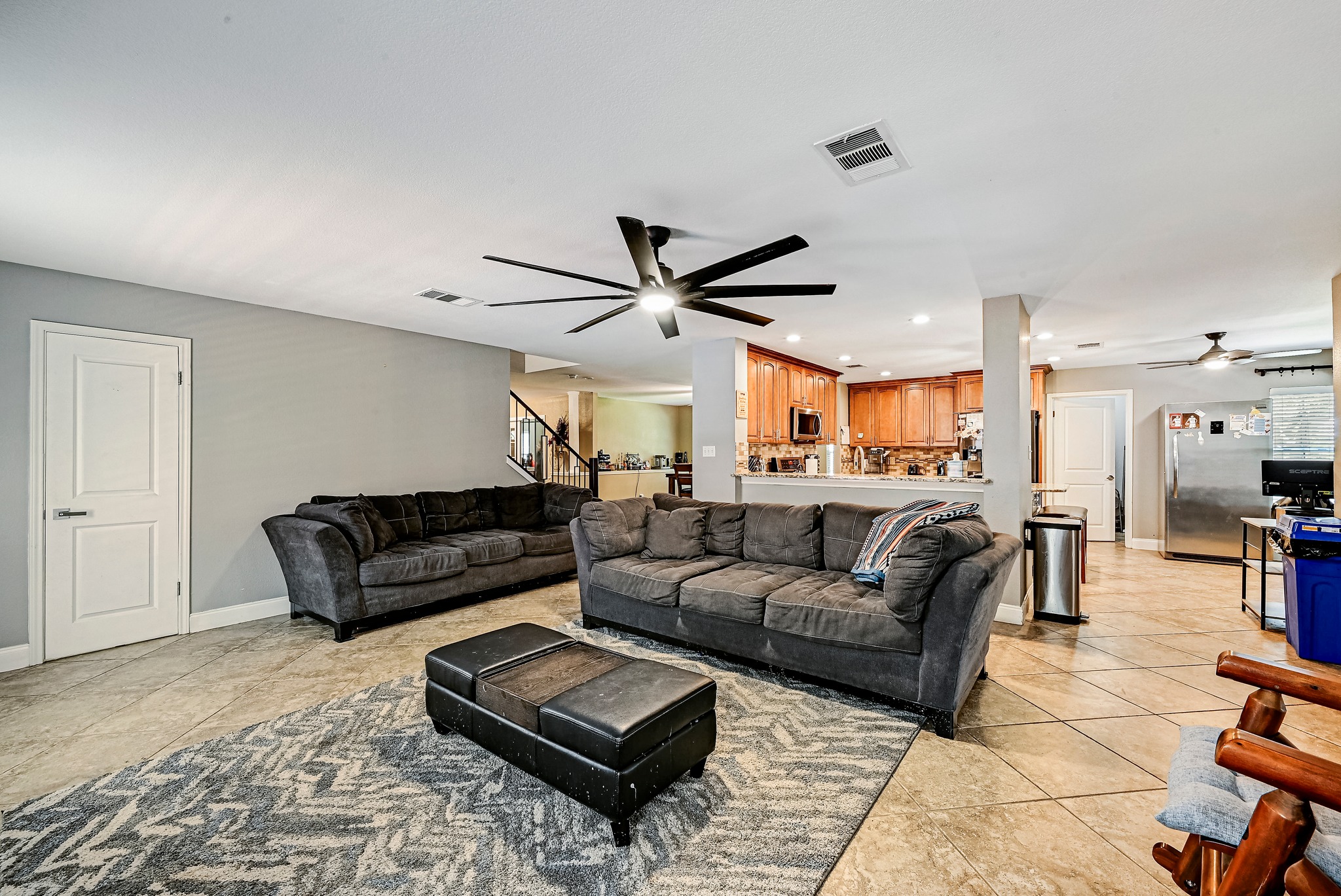 104 North Sumac Lane Georgetown, TX 78633 - Photo 12 of 40 An open concept living area seamlessly connects to the kitchen, perfect for daily living and entertaining.