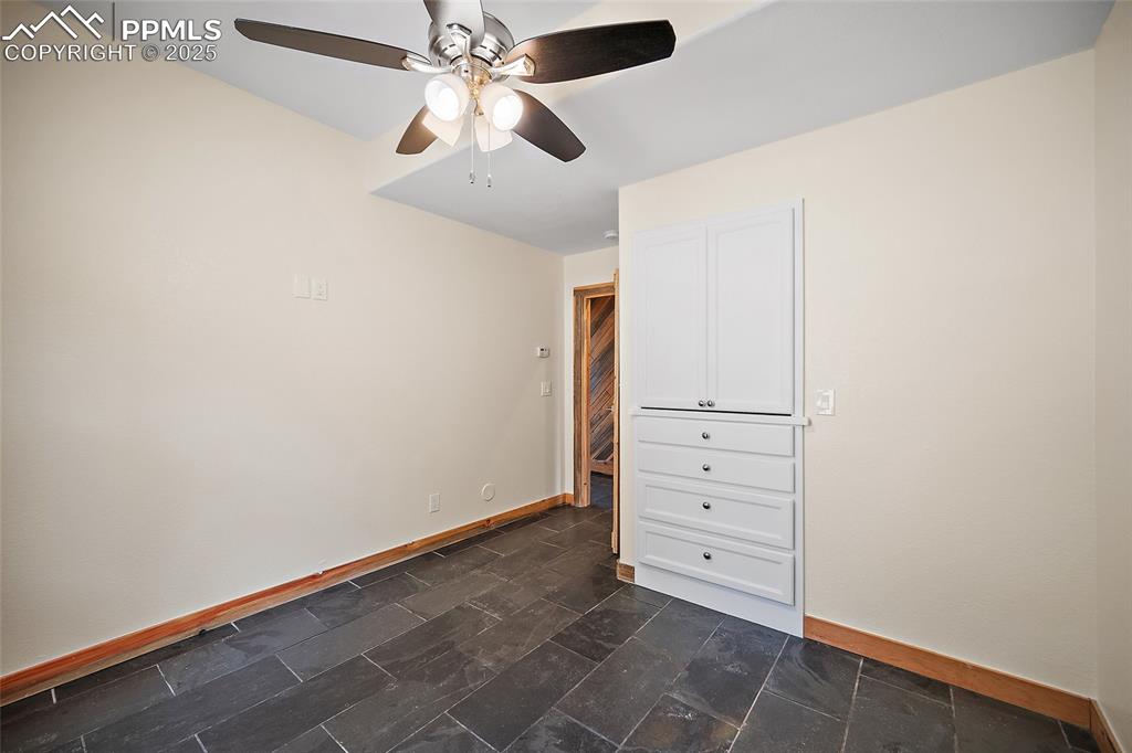 10739 Arnold Lane Rye, CO 81069 - Photo 21 of 50 an empty room with closet and fan
