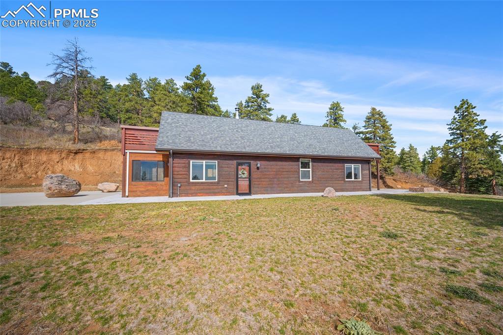 10739 Arnold Lane Rye, CO 81069 - Photo 40 of 50 a front view of a house with a yard