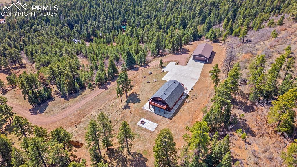 10739 Arnold Lane Rye, CO 81069 - Photo 43 of 50 an aerial view of residential house with outdoor space and trees all around
