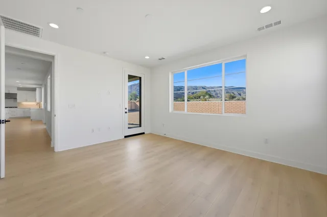 an empty room with windows