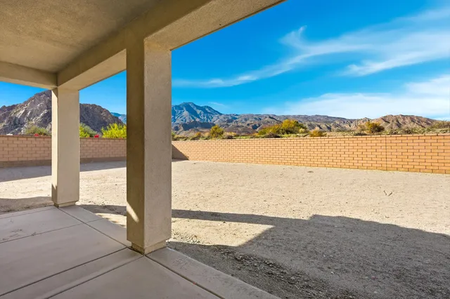 a view of ocean with a mountain