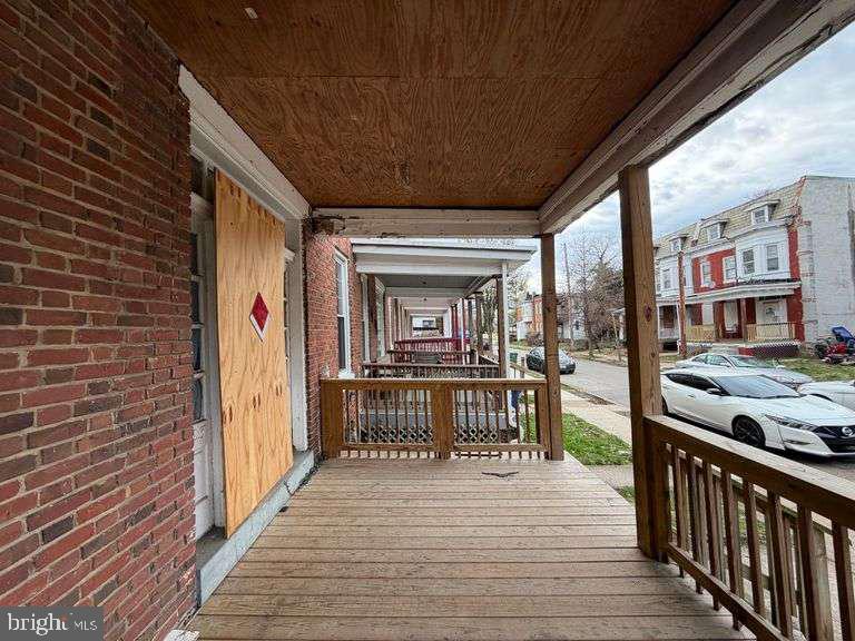 3923 Ridgewood Avenue Baltimore, MD 21215 - Photo 3 of 18 a view of a house with a porch