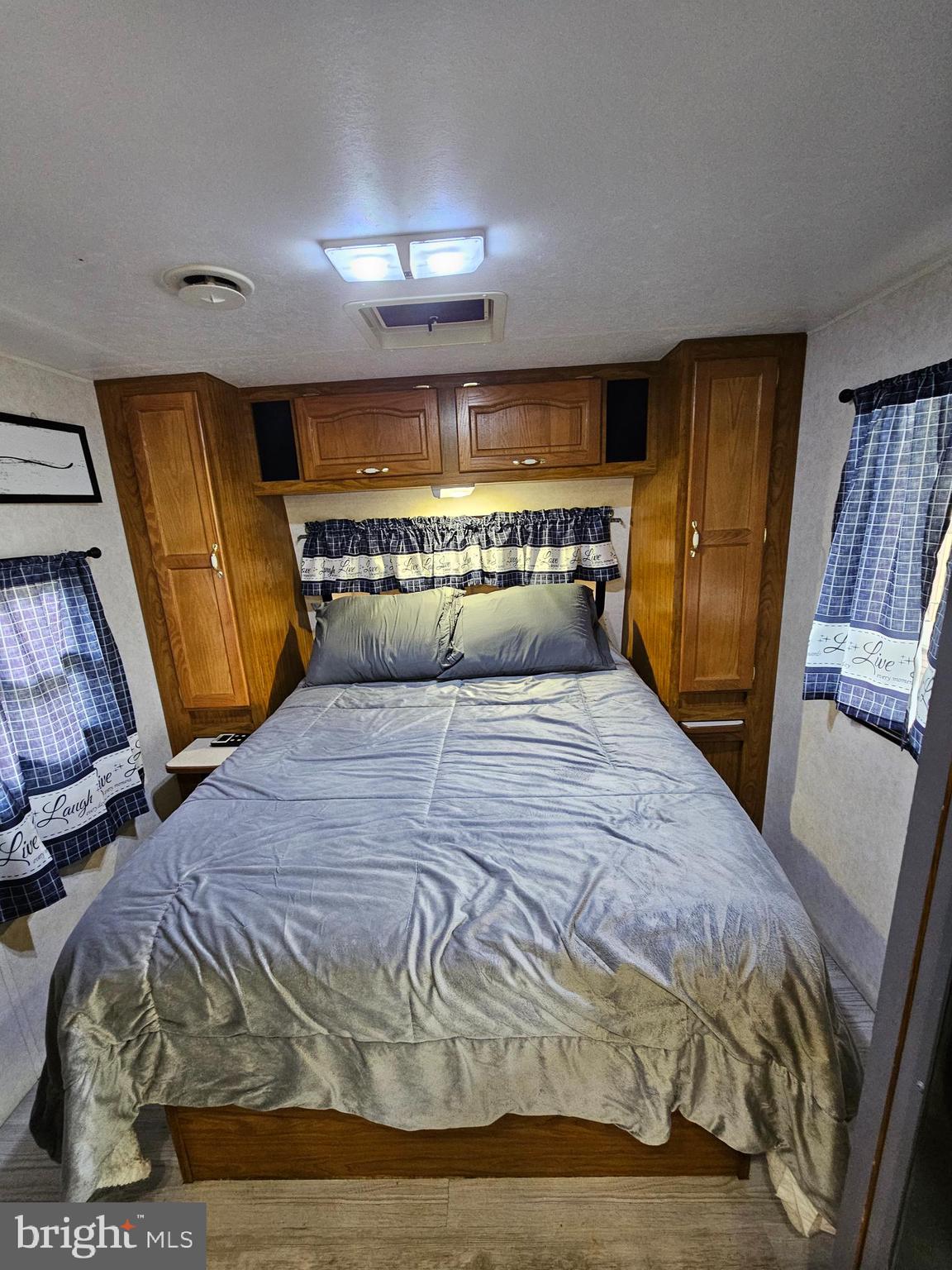 39 & 40 Hot Dog Road Falling Waters, WV 25419 - Photo 15 of 39 a bedroom with a bed and wooden floor