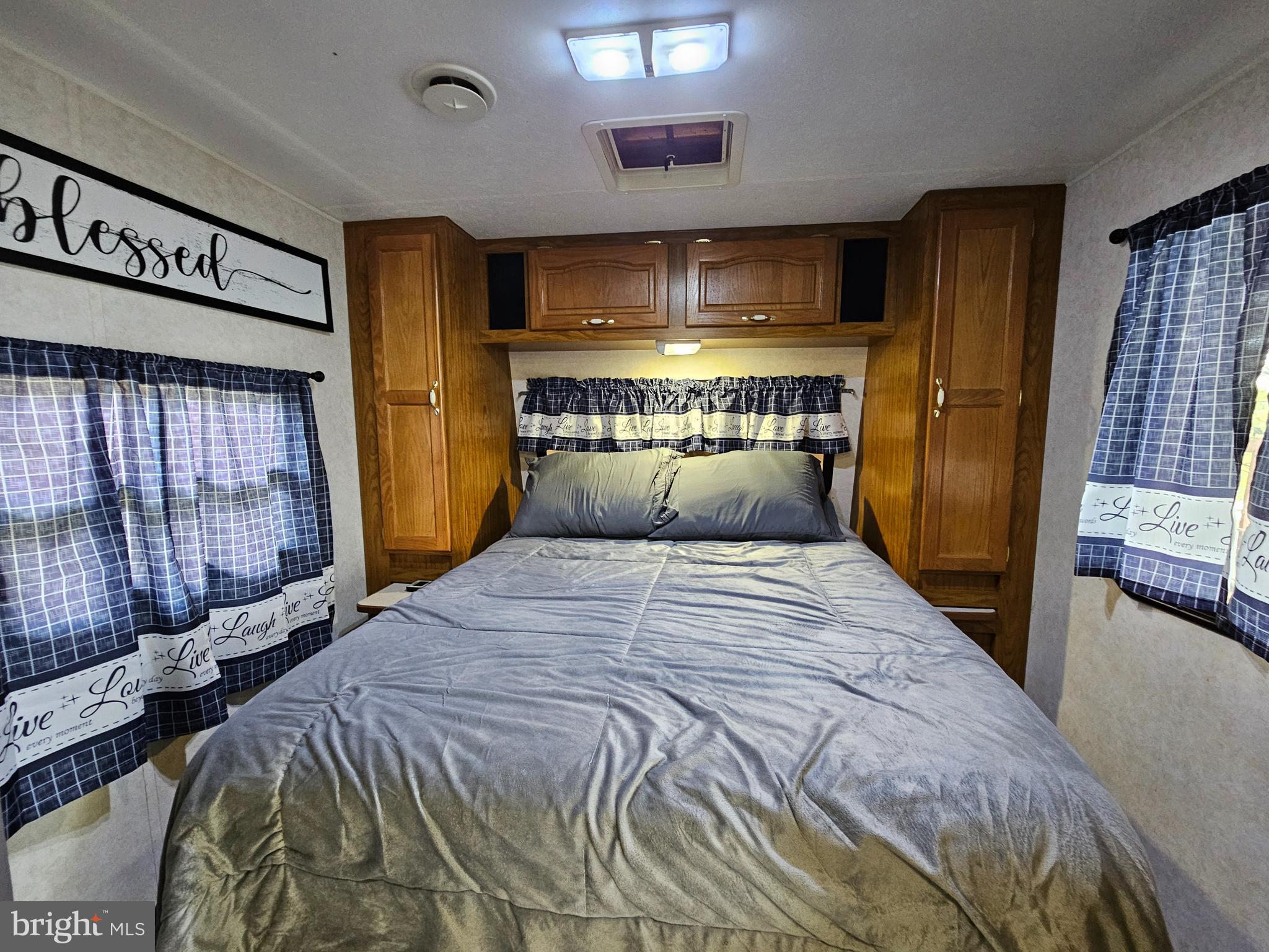 39 & 40 Hot Dog Road Falling Waters, WV 25419 - Photo 16 of 39 a bedroom with a bed and a large window
