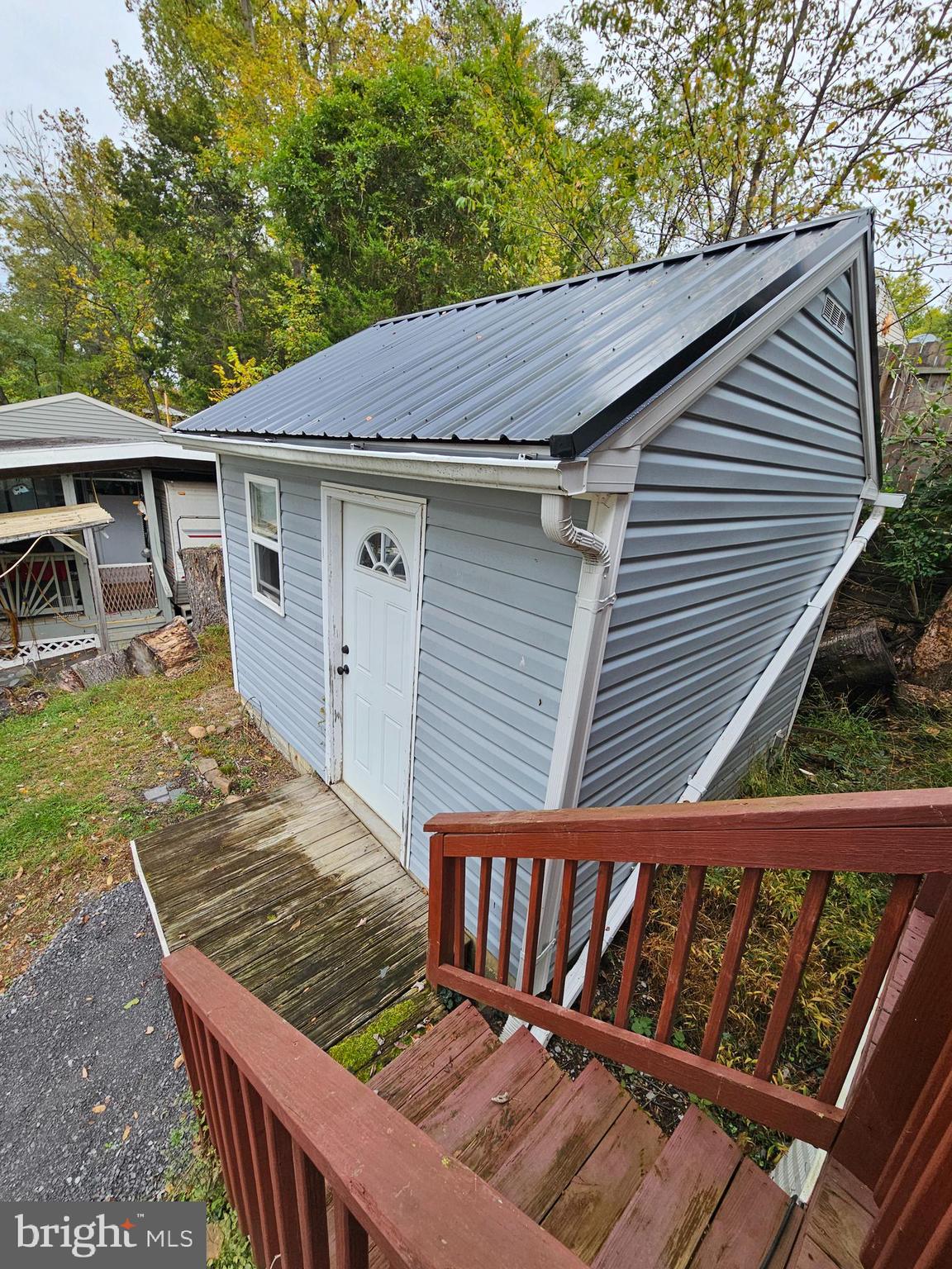 39 & 40 Hot Dog Road Falling Waters, WV 25419 - Photo 21 of 39 a view of a wooden deck and a yard