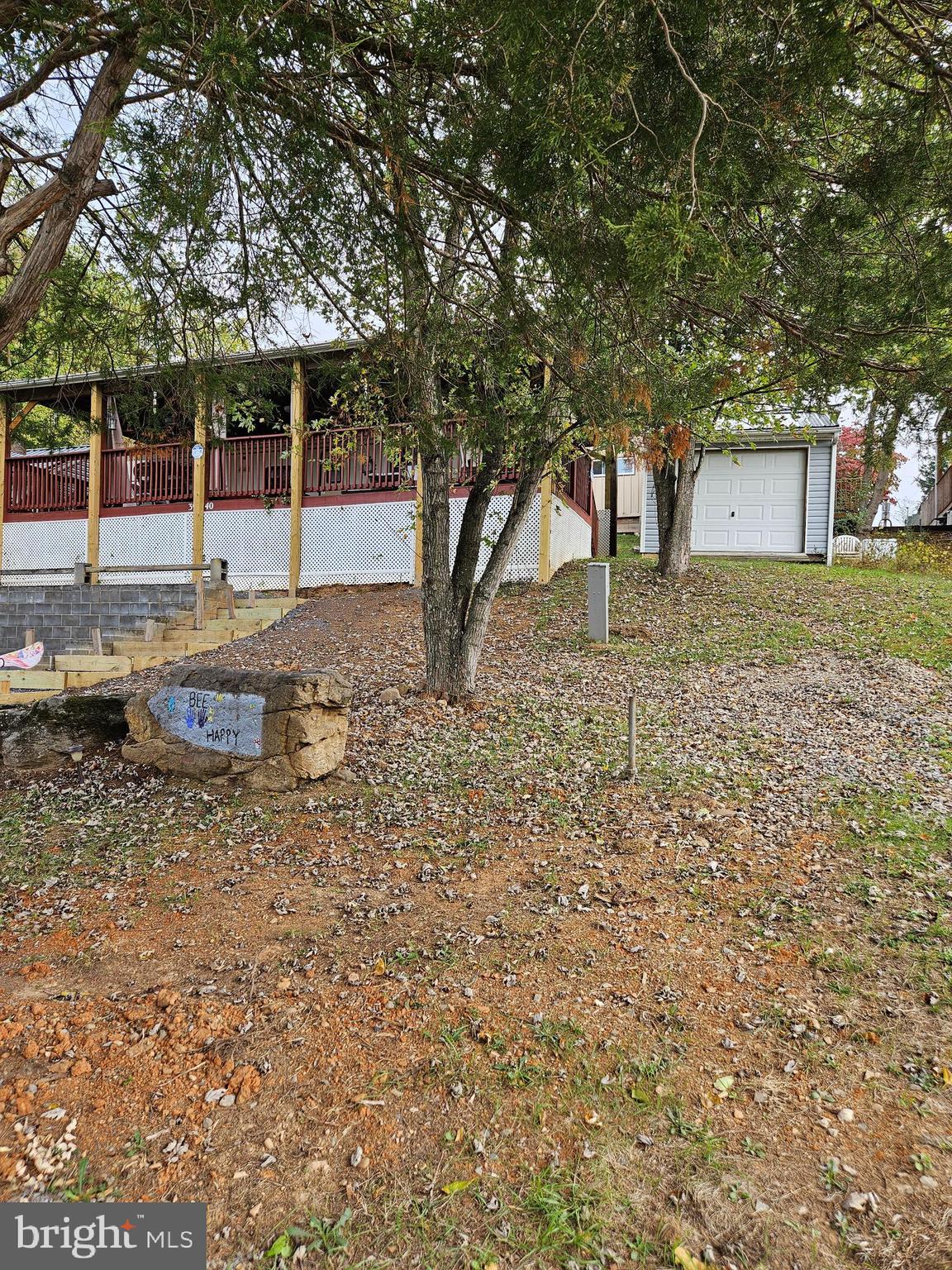 39 & 40 Hot Dog Road Falling Waters, WV 25419 - Photo 5 of 39 a backyard of a house with barbeque oven