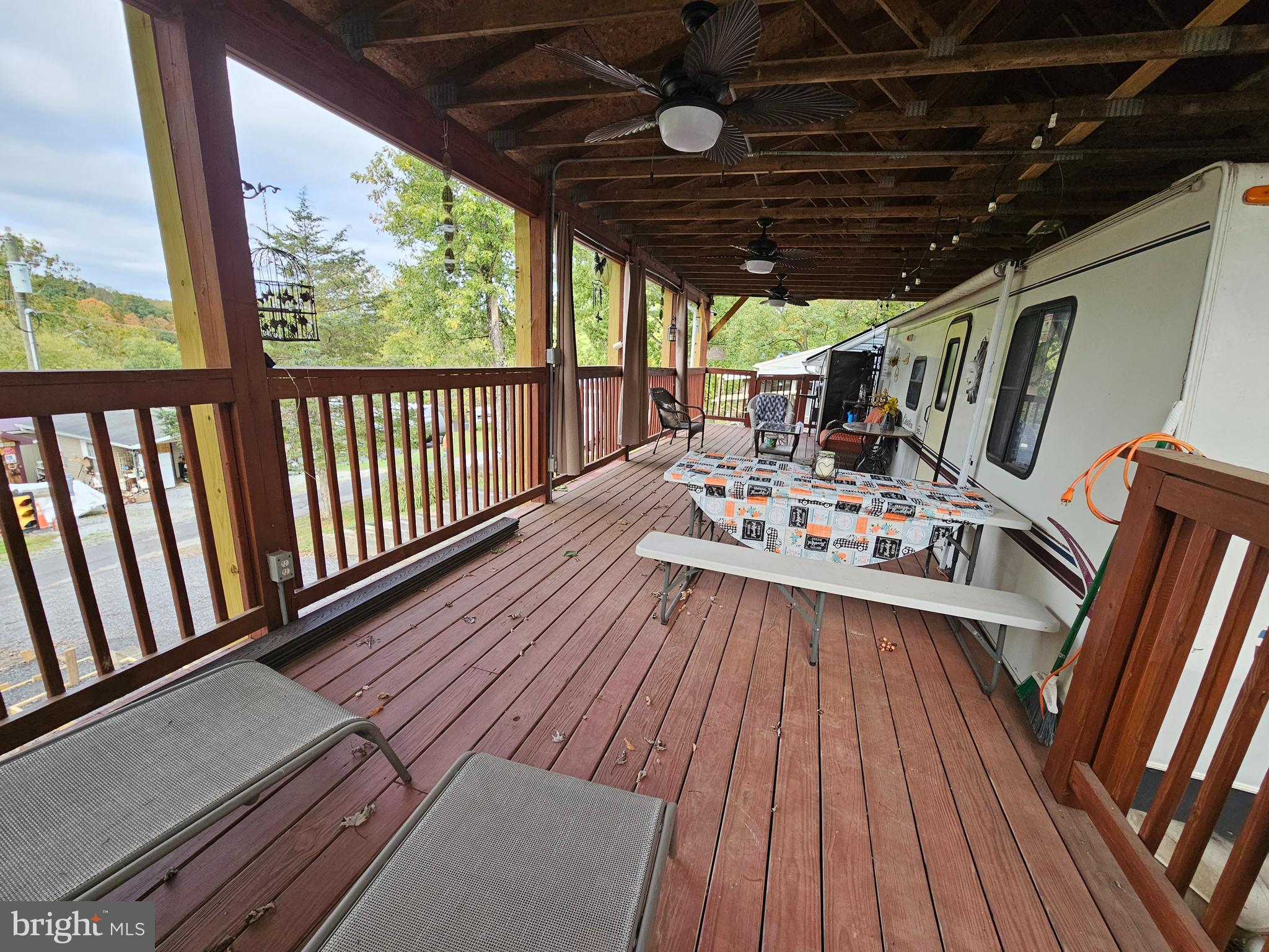 39 & 40 Hot Dog Road Falling Waters, WV 25419 - Photo 10 of 39 a view of a couches chair and wooden floor
