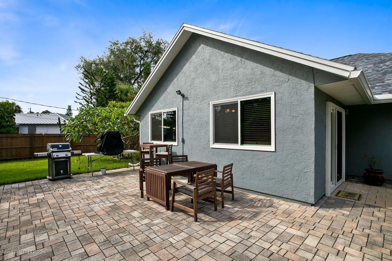 689 Bryant Road Palm Bay, FL 32908 - Photo 24 of 27 a view of a house with backyard and sitting area