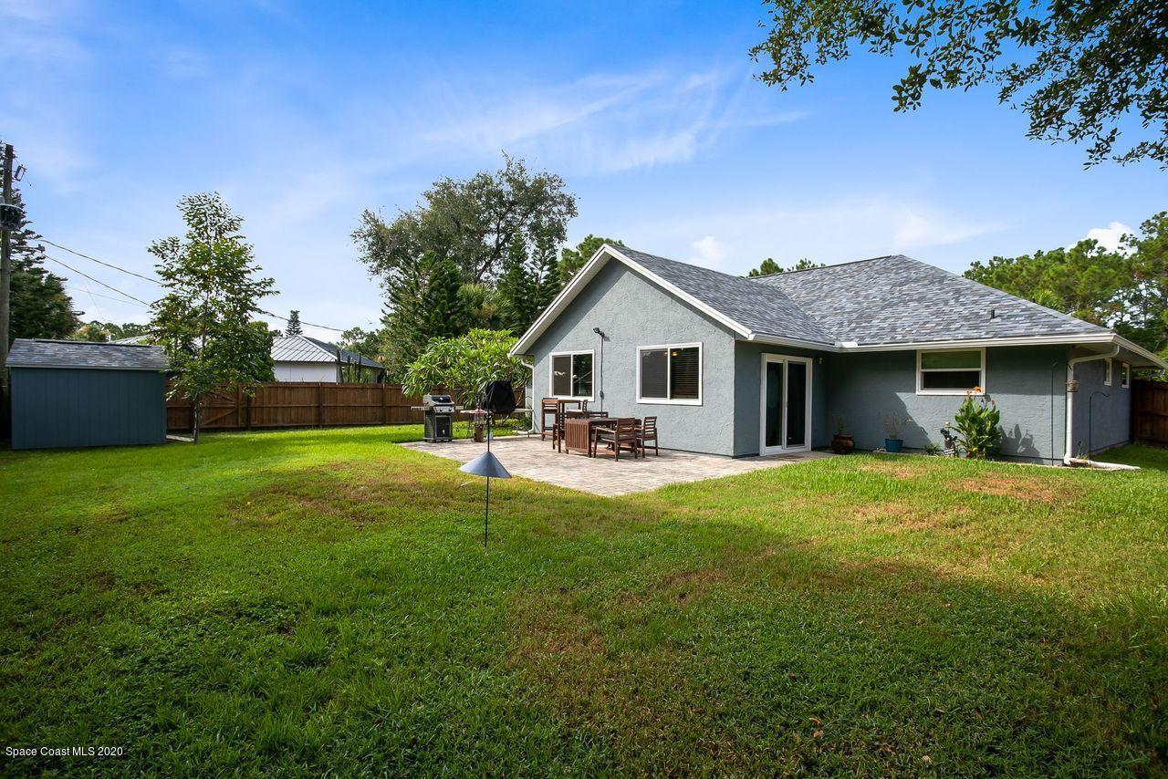689 Bryant Road Palm Bay, FL 32908 - Photo 25 of 27 a front view of house with yard and green space