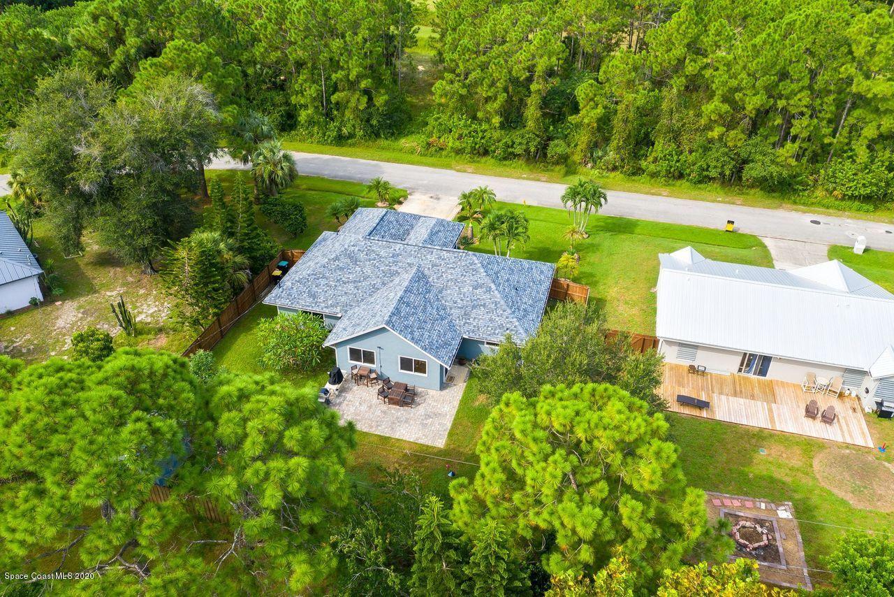 689 Bryant Road Palm Bay, FL 32908 - Photo 27 of 27 an aerial view of house with yard swimming pool and outdoor seating